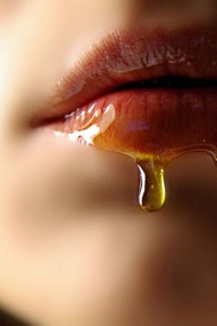 honey  dripping from a woman's mouth