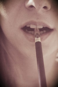 woman smoking clove cigarette