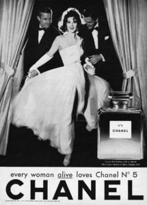 1937 - Suzy Parker, photographed by Richard Avedon for CHANEL N°5 advertising campaign