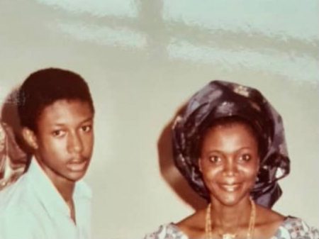 Nigerian teenager and his mother 90s