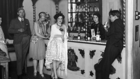  Flappers at the bar of Isa Lanchester's night club in London.