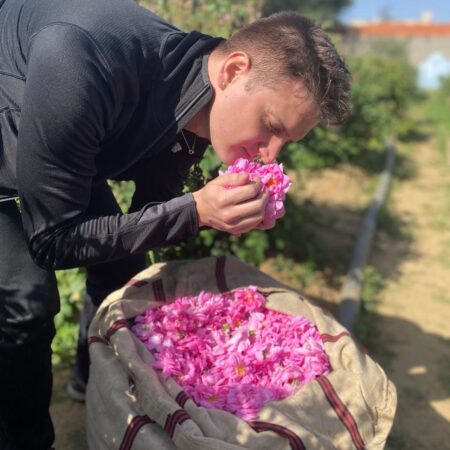 Kevin Mathys in Saudi Arabia smelling Ta'if Roses